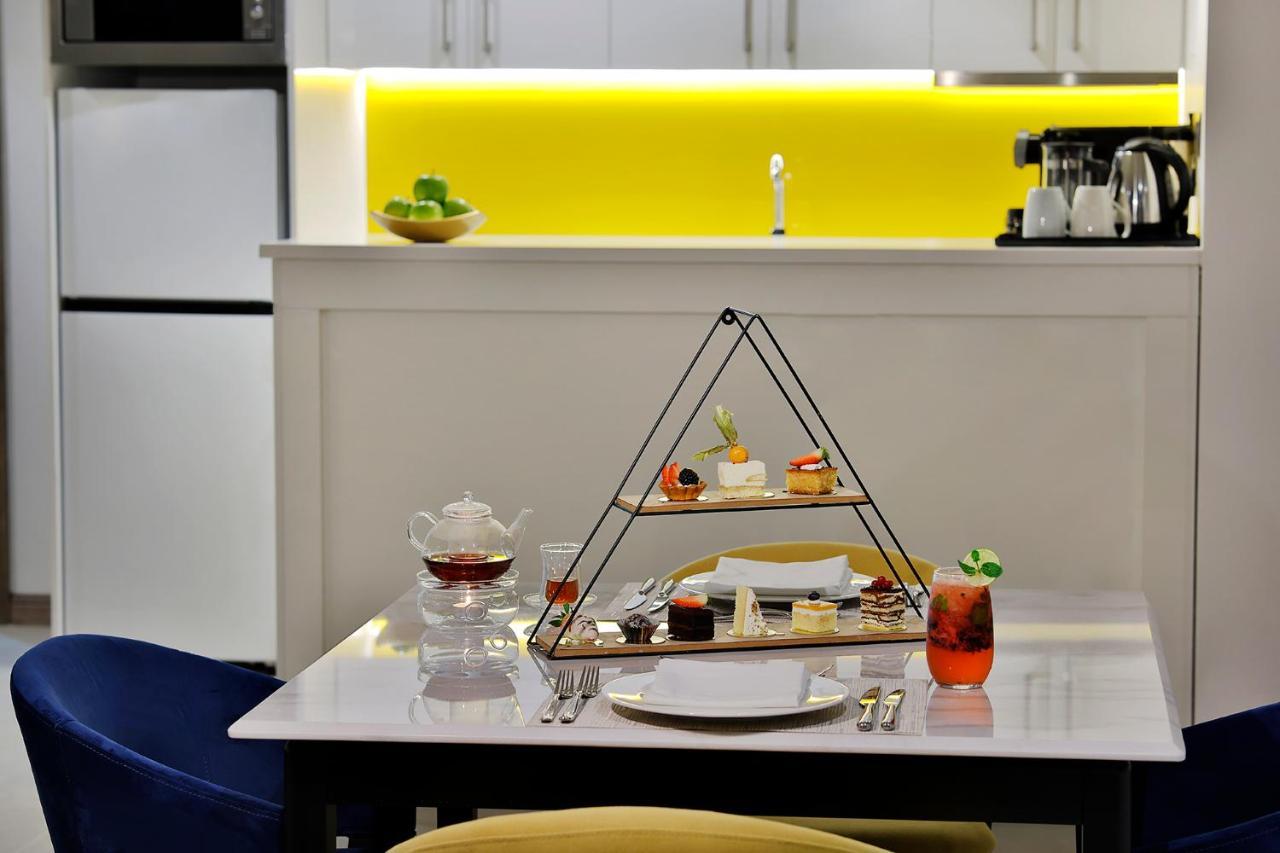 Voco Al Khobar By Ihg Hotel Екстериор снимка A pyramid cake stand