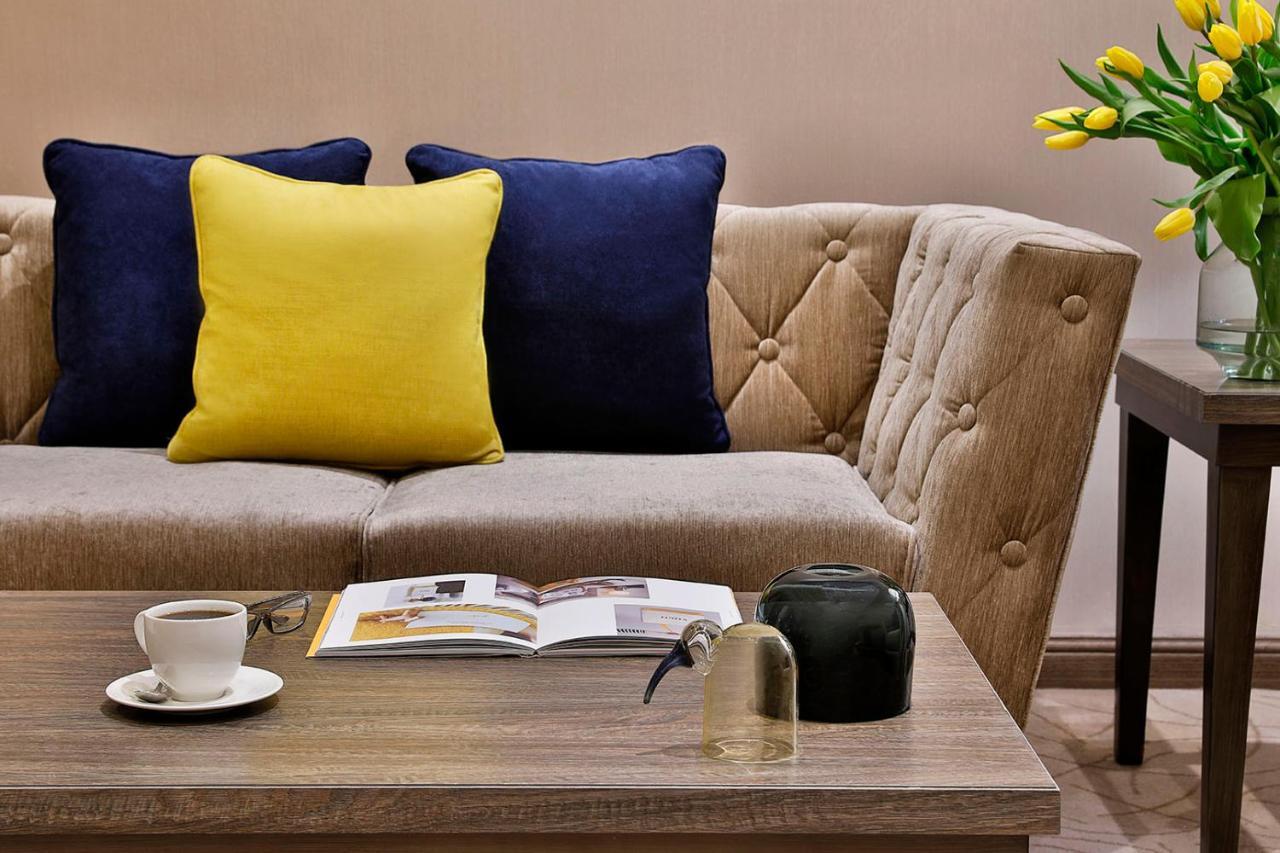 Voco Al Khobar By Ihg Hotel Екстериор снимка A sofa with cushions